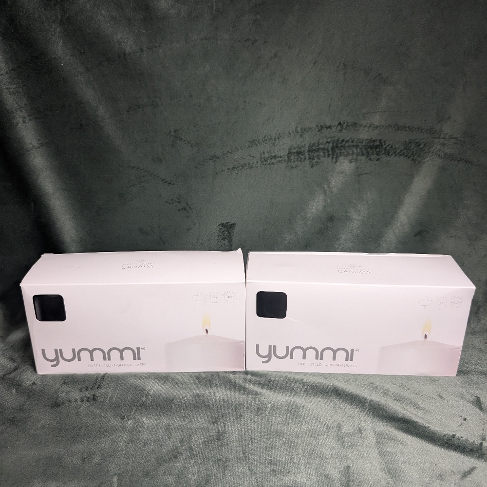 2 NWT Yummi 3x4 Black Pillar Candles 3 pack 40 hours. Clean Burning. MSRP $56